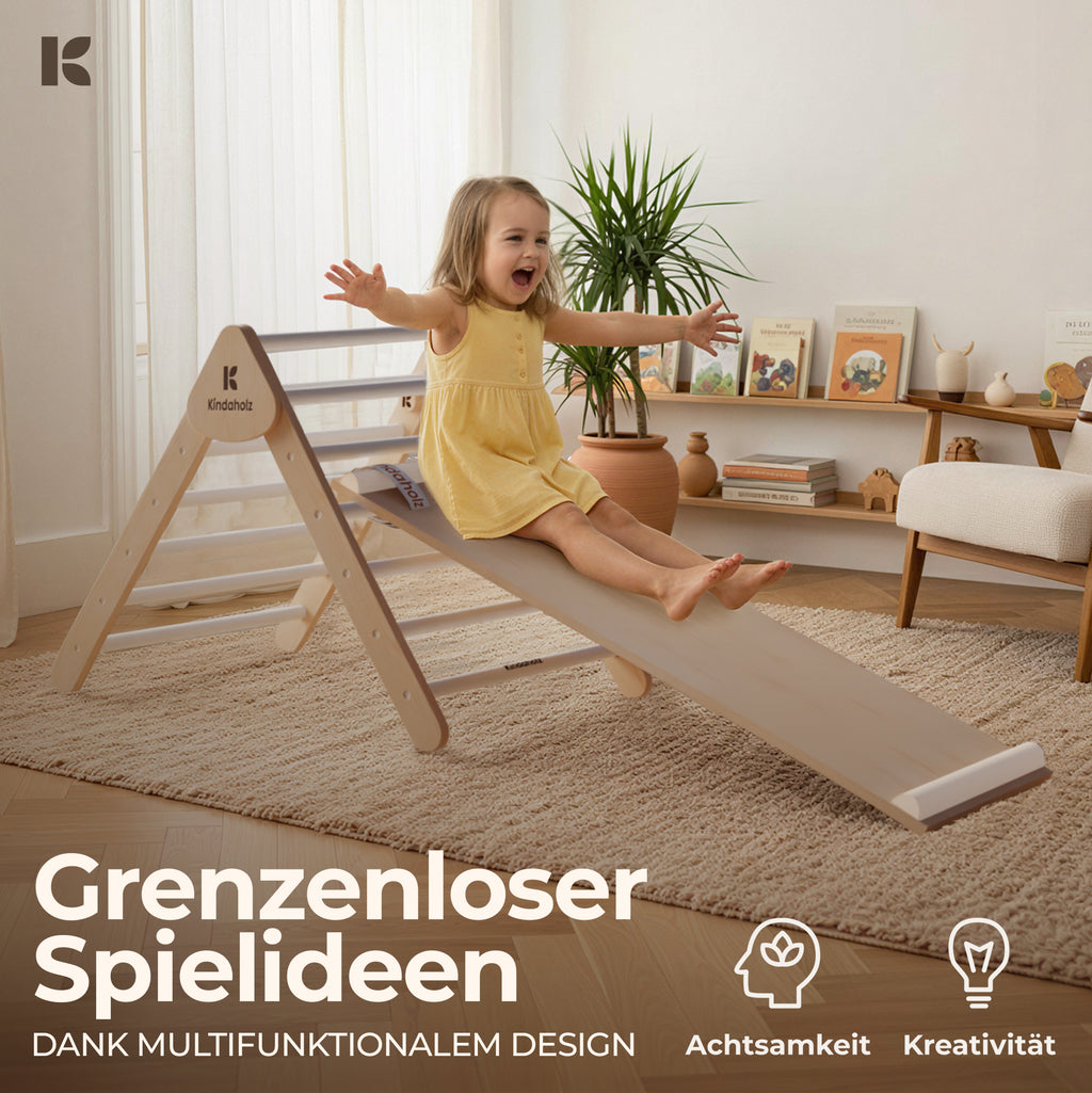 Mädchen rutscht die MIKA Rutschrampe hinunter – grenzenlose Spielideen dank multifunktionalem Design, fördert Kreativität und Achtsamkeit